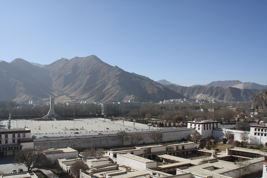 In a river valley ringed by rocky mountains, Lhasa has abundant sunshine, even in December. Here, the view from the Potala Palace of the Chinese-built, spire-shaped monument commemorating the 50th anniversary of the “peaceful liberation of Tibet” by the People’s Liberation Army in 1950–51.