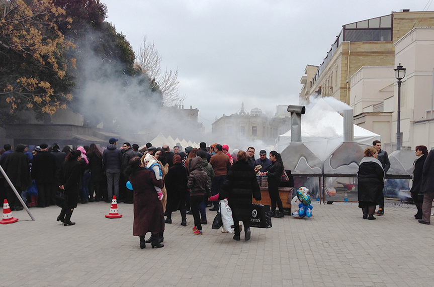 Within the walled Old City (Icheri Sheher) of Baku, families were enjoying Navroz festivities with traditional performances, music and food. Here, wafts of smoke spread from the chimneys of nearby kebab grills.