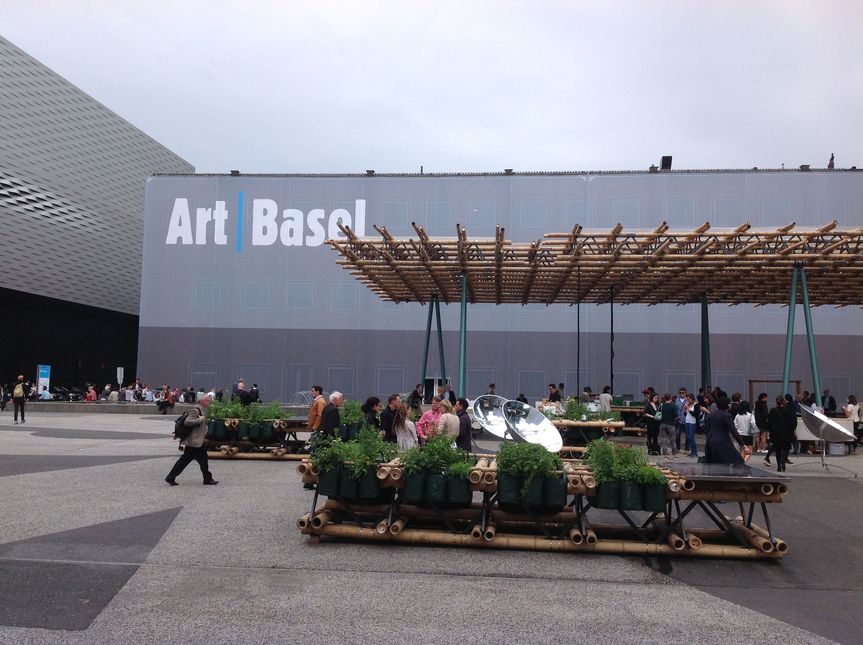 View of Messeplatz outside Hall 2, with Do We Dream Under the Same Sky (2015), an architectural-culinary intervention by RIRKRIT TIRAVANIJA in collaboration with architect-curator Nikolaus Hirsch and Michel Müller, who designed the modular bamboo structure, and Finnish chef Antto Melasniemi. The structure will return to “the land” near Chiang Mai, a utopian farming project set up by Rirkrit and fellow Thai artist KAMIN LERTCHAIPRASERT. All photos by HG Masters for ArtAsiaPacific.