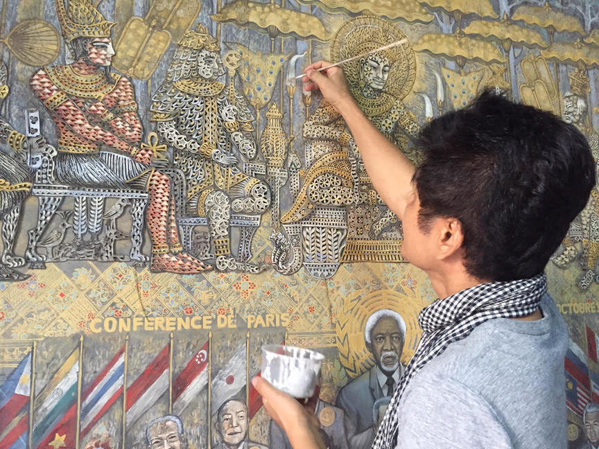 LEANG SECKON working on his mixed-media-on-canvas project, Prah Kumadeng/Prah Sdeng: Prediction, 2018. Photo by Reaksmey Yean for ArtAsiaPacific.