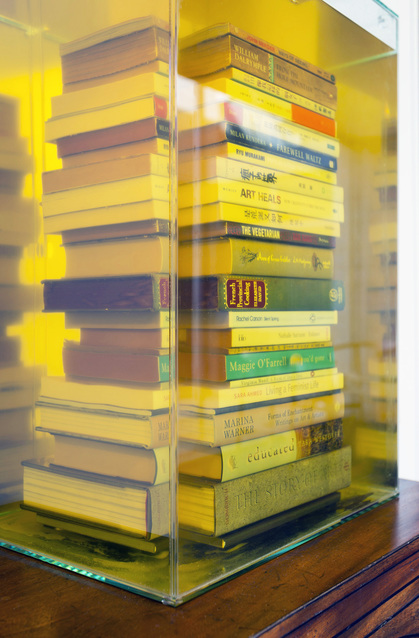 Detail of CHOI YAN CHI’s Drowned Books, 2019, glass tank, 24 books, vegetable oil, air pump, air regulator, plastic pump, 138 × 65 × 43 cm, at “Women in Art: Hong Kong,” New Hall Art Collection, Murray Edwards College, University of Cambridge. Copyright the artist.