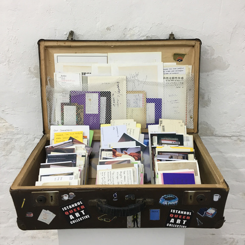 ISTANBUL QUEER ART COLLECTIVE, Just in Bookcase, 2017, wooden suitcase filled with personalized library cards, memorabilia and photos, dimensions variable. Photo by Eda Sancakdar. Courtesy the artists.