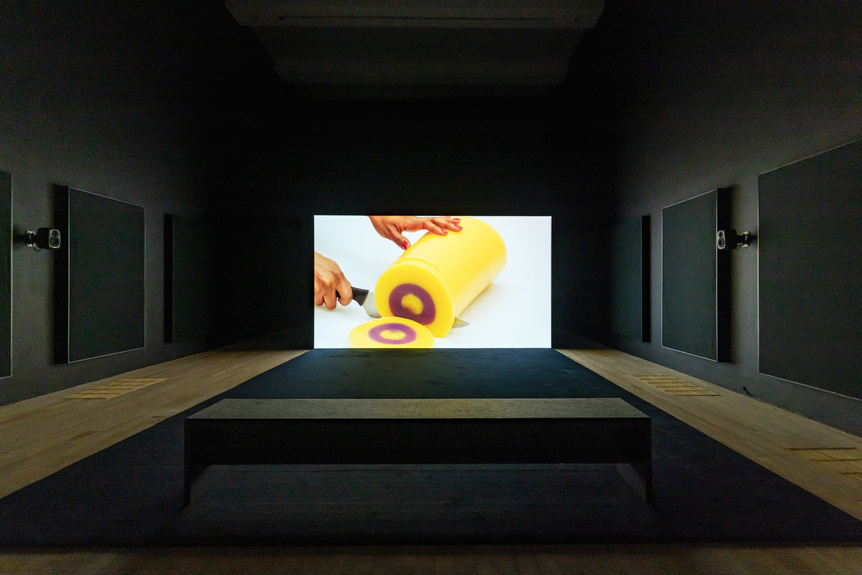 Installation view of MIKA ROTTENBERG’s Spaghetti Blockchain, 2019, single-channel video installation with sound and color: 18 min 15 sec, at “SNEEZE,” Tai Kwun Contemporary, Hong Kong, 2020–21. Copyright the artist. Courtesy the artist and Hauser & Wirth, New York / Los Angeles / Zurich / London / Somerset / Hong Kong / St. Moritz / Zürich / Gstaad / Southampton.