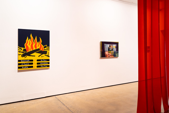 Installation view of (from left to right) GORDON BENNETT’s Relative/Absolute (Fire), 1991, acrylic and flashe on canvas, 116 × 89 cm; and ANNE WALLACE’s Fire in the Hills, 2019, oil on linen, 61.4 × 92 cm, at “On Fire: Climate and Crisis,” IMA, Brisbane, 2021. Photo by Louis Lim. Courtesy the artists.